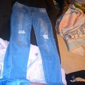 Light blue ripped jeans